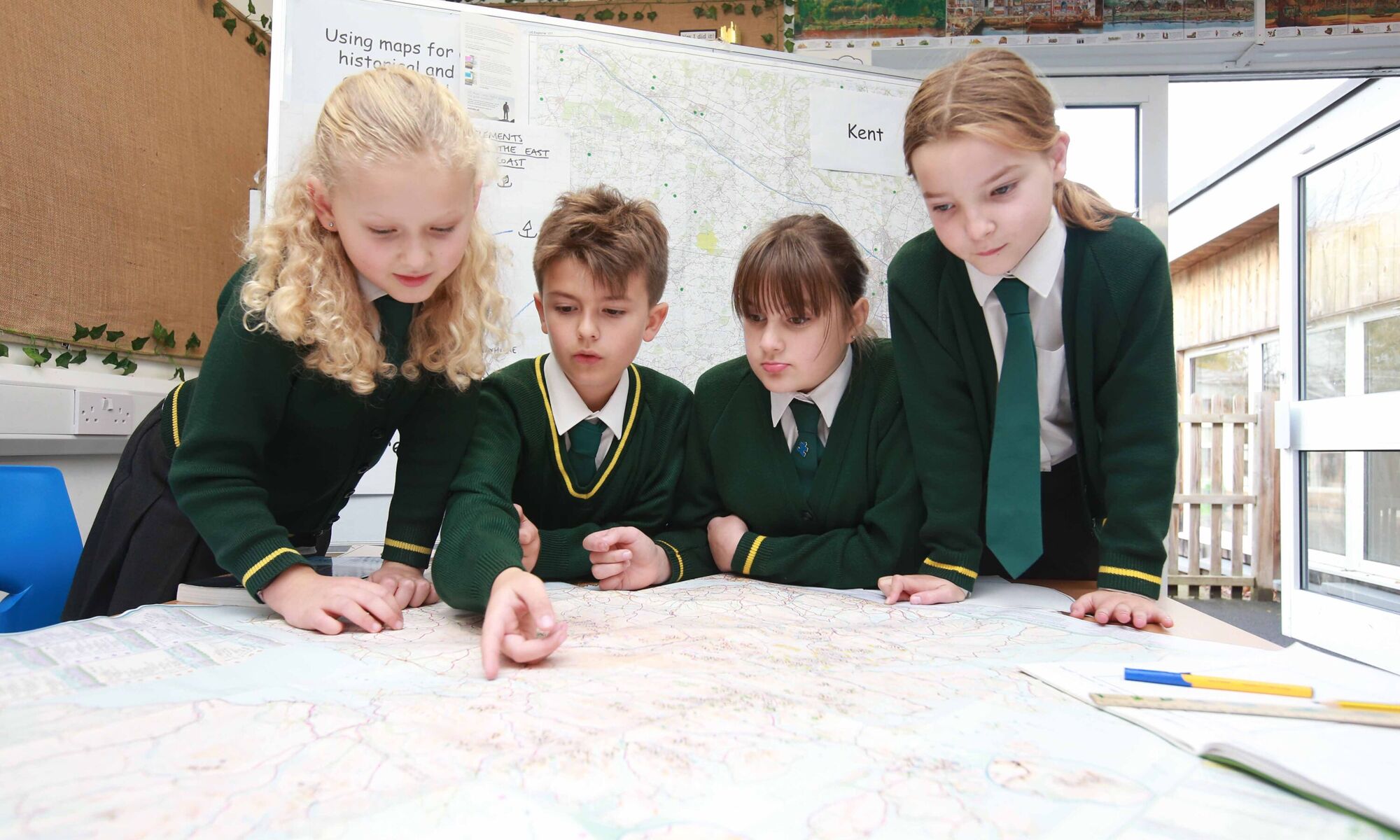 Smarden primary pupils viewing a map